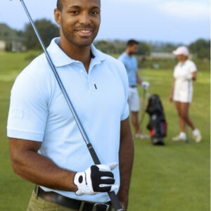 golfer standing with club over shoulder